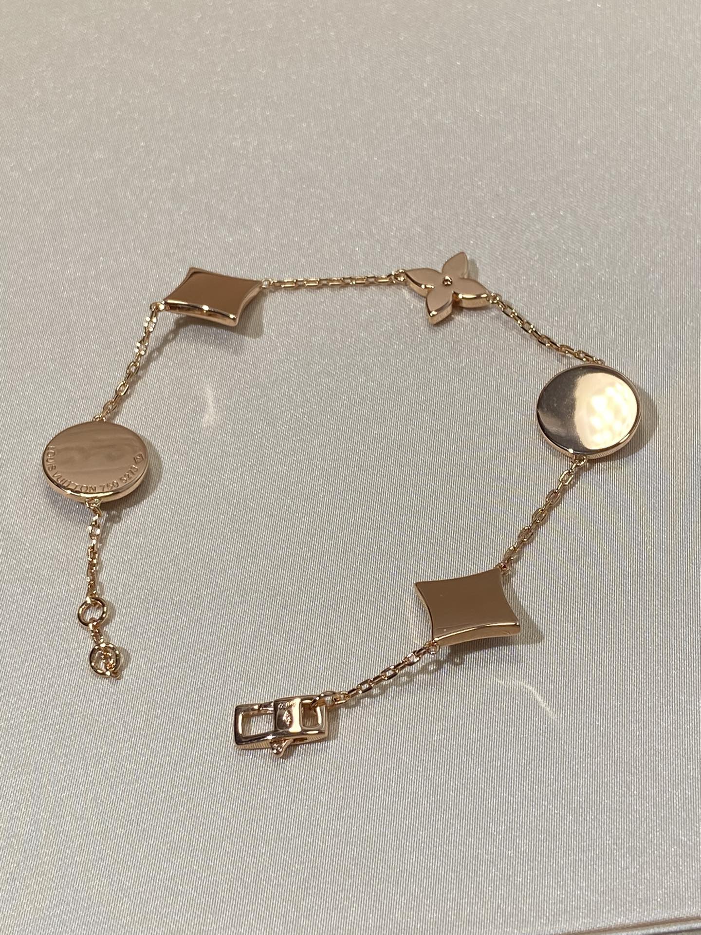 ¡®Aura Jewels¡¯STAR AND SUN 5 MOTIF MOP PINK GOLD BRACELET